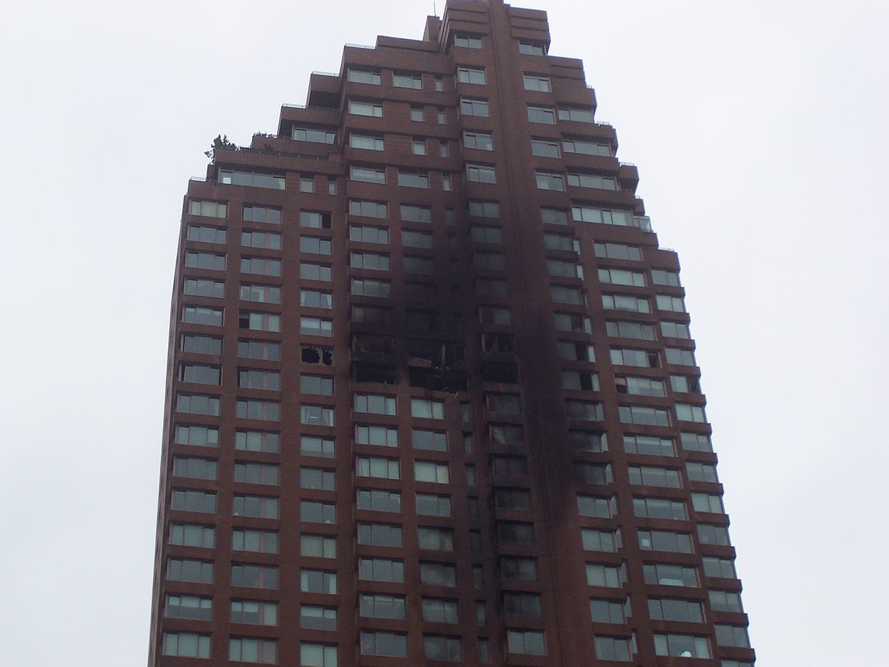 The impact of a small plane that crashed into a tower in New York