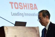 Le PDG de Toshiba, Satoshi Tsunakawa, lors d'une conférence de presse à Tokyo, le 14 mars 2017