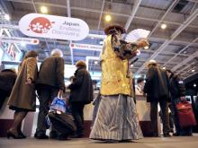 Des visiteurs dans les allées du Salon mondial du Tourisme à Paris, le 21 mars 2013