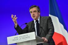 François et Penelope Fillon lors d'un débat de candidats à la présidentielle à Aubervilliers, près d