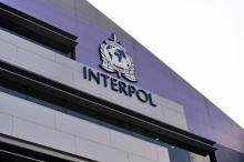 Logo Interpol sur un de ses immeubles à Singapour, le 13 avril 2015