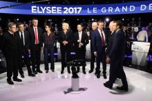 Les 11 candidats à la présidentielle (g-d): Jean-Luc Mélenchon, François Fillon, Jean Lassalle, Nath