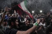 Des Iraniens fêtent la victoire à la présidentielle de Hassan Rohani, le 20 mai 2017