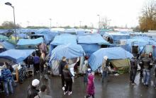 Des demandeurs d'asile dans le camp de Blida à Metz le 13 novembre 2013