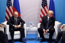 Le président russe Vladimir Poutine (g) et son homologue américain Donald Trump (d), le 7 juillet 20