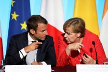 Le président français Emmanuel Macron et la chancelière allemande Angela Merkel à Paris le 28 août 2