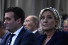 Florian Philippot, vice-président du Front national (G) et Marine Le Pen, présidente du Front nation