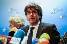 Le président catalan destitué Carles Puigdemont arrive pour une conférence de presse à Bruxelles, le